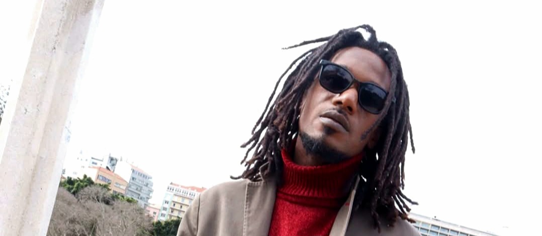 Man with Dreadlocks in City